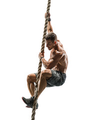 Muscular man climbing a thick rope isolated on transparent background