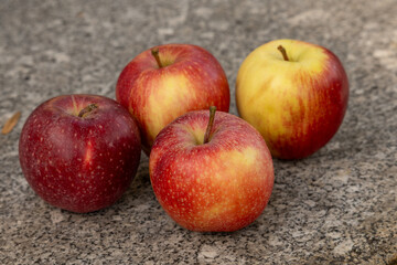 red apples on a wooden table