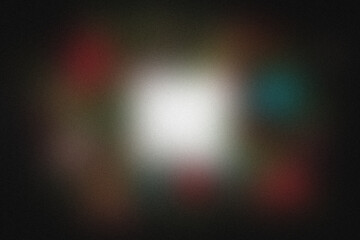 Abstract glowing light burst with colorful bokeh, suggesting energy and wonder.