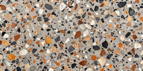 Close up of a terrazzo floor with colorful aggregate chips and cement background