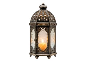 Ornate antique-style lantern with a warm candlelight glow against a stark black background.