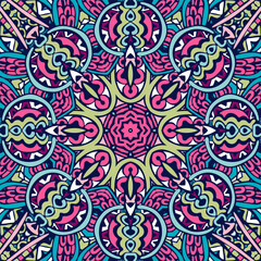 A vibrant and intricate psychedelic mandala pattern featuring symmetrical floral and geometric shapes in bright colors.