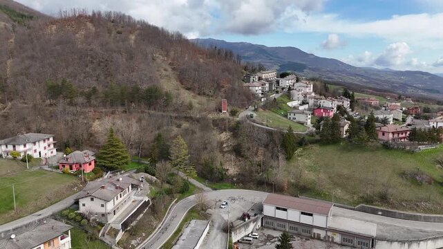 Bardi charming Italian village and scenic rolling landscape in Parma Italy in Ceno Valley near Apennines, near Majestic medieva Bardil fortress castle perched atop a hill