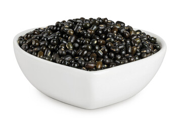 Black bean or Urad dal, black gram, vigna mungo in ceramic bowl isolated on the white background