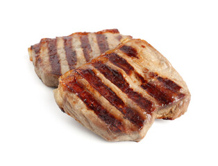 Steaks of delicious grilled beef meat isolated on white