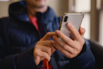 hand using smartphone with calendar app on screen. Concept of time management, planning, scheduling, productivity, digital organizer, business reminder modern lifestyle efficiency.