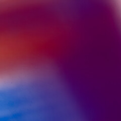 Abstract background of glowing purple and blue lights with a bokeh effect © sadashiv