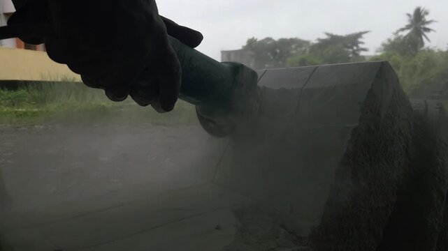 Stone Carving - Stone Art in India. Indian stone mason Creating abstract sculpture Of granite Stone. Cutting rock with grinder, chisel and hammer with traditional technique. Slow Motion 4k Footage