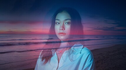 A double exposure portrait of a young woman, her face overlaid with a surreal beach where pink, purple, and blue tones blend under soft neon light.