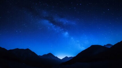 Dark Mountain Range Under a Starry Night Sky