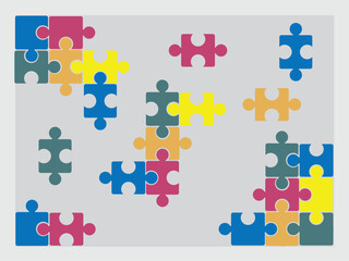 Colorful jigsaw puzzle pieces scattered and partially connected on a gray background, some pieces are isolated.