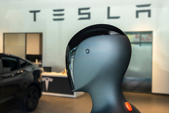 Tesla Optimus AI-powered humanoid robot with sleek modern design.