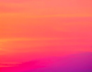 Naklejka premium Vibrant Gradient Sky with Orange, Pink, and Purple Hues at Sunset