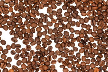 Freshly roasted coffee beans isolated on white background. coffee texture close-up, top view.