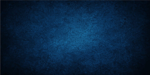 Dark blue grunge wall with an old, textured vintage pattern for a blank backdrop