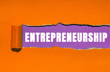 Entrepreneurship message written on ripped torn paper background. Conceptual Entrepreneurship...