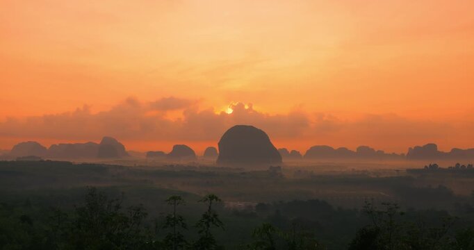 Sun Rising Behind Misty Cliffs At Din Daeng Doi, Krabi, Thailand