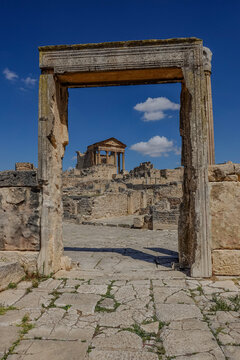view of roman temple through door in douga tunisia