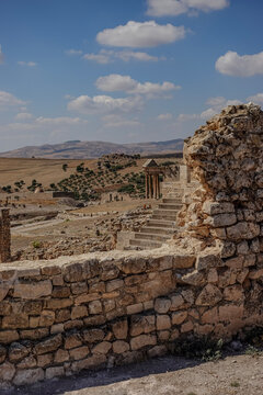 Wall over looking roman amphitheater and temple in douga tunisia