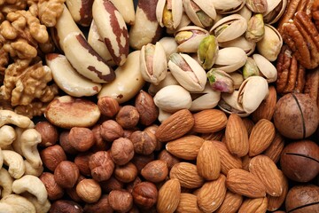 Mix of different nuts as background, closeup