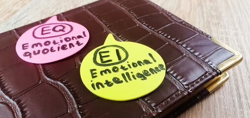 IQ EQ, emotional intelligence, emotional quotient inscription, text on colored sheets of paper on a notebook, IQ EQ concept, psycho-emotional state management.