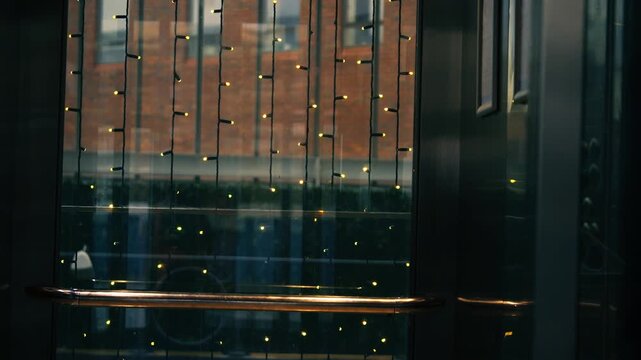 Lift elevator doors closing in shopping mall