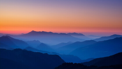 Dreamy Sunset Over Layered Hazy Mountains In Shades Of Purple Orange And Deep Blue Creating A Serene Almost Abstract Landscape