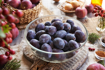 Fresh plums, apples, ginger, thyme and spices - preparation of chutney - homemade relish