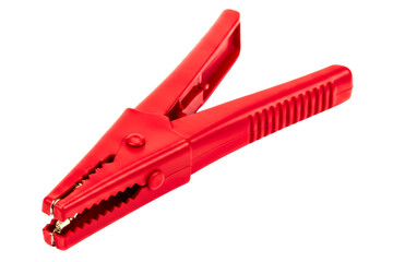 Red plastic insulated electrical alligator clip for electronics on a transparent background