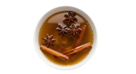 Overhead shot of a bowl of hot toddy with cinnamon sticks and star anise isolated on transparent background for a comforting and flavorful beverage