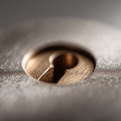 Intimate macro shot of a keyhole. Security concept for access, privacy, or protection. Metaphor for opportunity, solution, or entry. Use for financial, safety, or mystery themes.