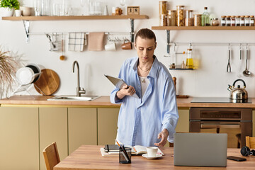 Young man preparing a warm drink while exploring ideas in a cozy kitchen setting