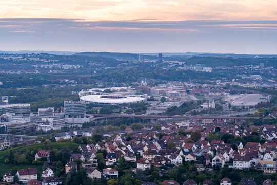 Stuttgart cityscape with Mercedes-Benz Arena at sunset