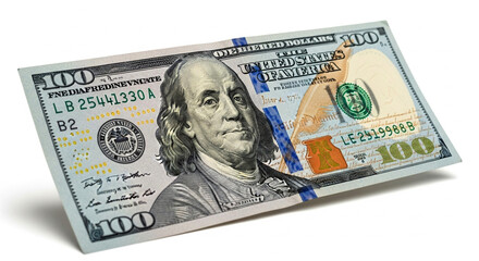 Photo of a crisp new hundred dollar bill, featuring benjamin franklin, isolated on a clean white background