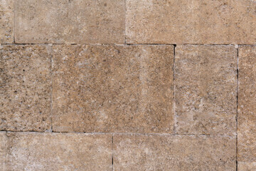 Old stone wall, a beautiful background for the designer, copy empty space