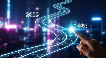 Photo of a finger touches a glowing digital path leading from 2025 to 2026, symbolizing future progress and technology