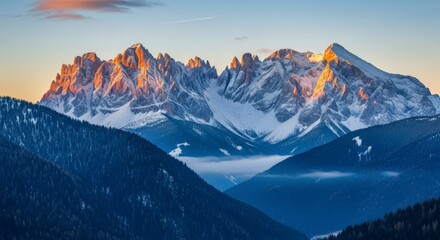 Golden hour illuminates snow-capped peaks in the majestic Alps