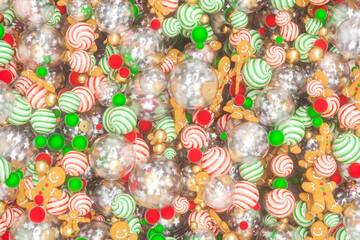 Christmas background with candy Christmas Baubles. 3d rendering