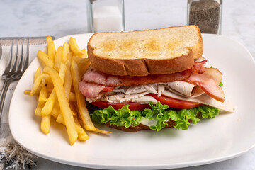 turkey blt sandwich with fries