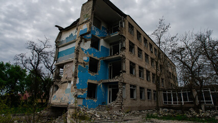 ruined street and destroyed houses the city Kiev war in Ukraine