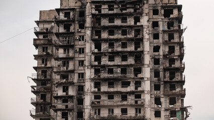 ruined street and destroyed houses the city Kiev war in Ukraine