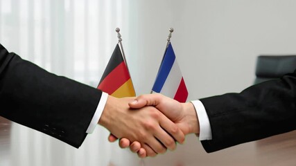 German French partnership handshake seals deal video shows business agreement in action, capturing international cooperation and successful negotiation - Powered by Adobe