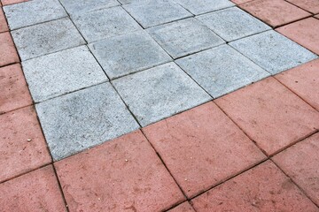 Red and white paver block sidewalk pattern background