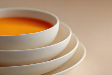 minimalist print advertisement featuring colorful coffee cup against clean white background