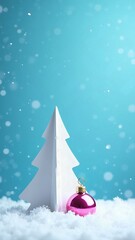 Minimalist white paper Christmas tree and glossy pink ornament on snowy ground against soft blue background. Perfect for holiday decor and winter design