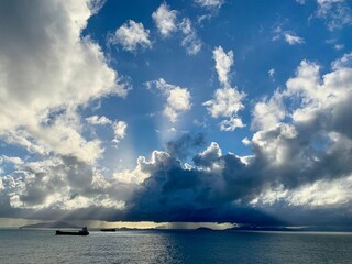 Dramatic Sky with Sun Rays over the Sea