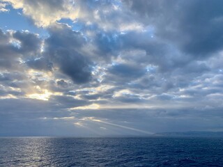 Dramatic Sky with Sun Rays over the Sea