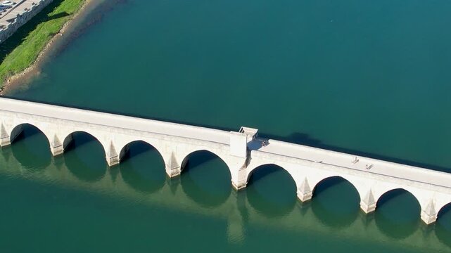 Aerial view of the Mehmed Pa&scaron;a Sokolović Stone Bridge in Vi&scaron;egrad, Bosnia and Herzegovina, a historically significant Ottoman structure featured in Ivo Andrić's novel The Bridge on the Drina