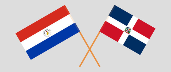 Crossed flags of Republic of Paraguay and Dominican Republic. Official colors. Correct proportion. Vector illustration