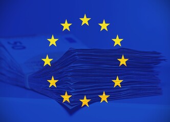 Pile of fifty euros on the table , concept of corruption and luxury